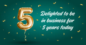 Golden balloon in the shape of a 5, surrounded by gold confetti, "Delighted to be in business for 5 years today"